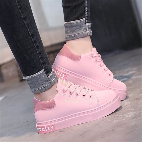 women pink designer sneakers.